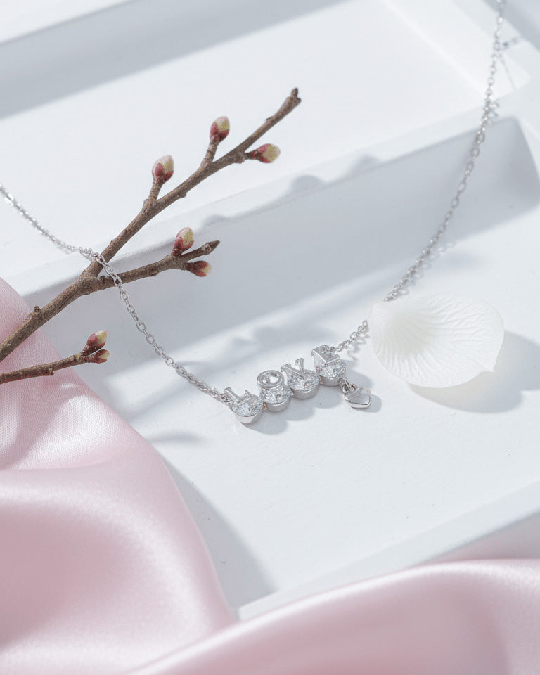 Sterling Silver “LOVE” CZ Necklace with Heart Charm.