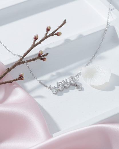 Sterling Silver “LOVE” CZ Necklace with Heart Charm.