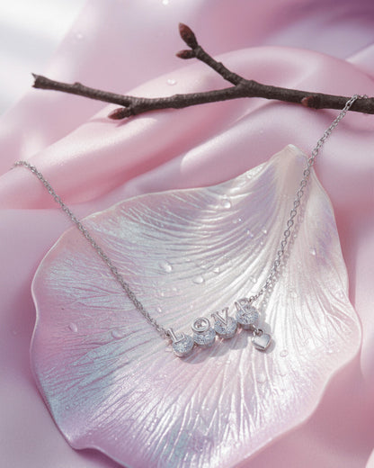 Sterling Silver “LOVE” CZ Necklace with Heart Charm.