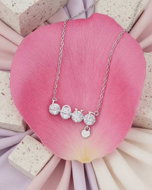 Sterling Silver “LOVE” CZ Necklace with Heart Charm.