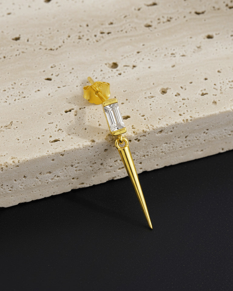 Baguette stone stud earring with dangling cone shape.