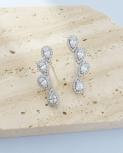 pear shapes in halo setting climber earrings
