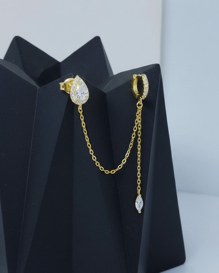 CZ pear shape stud chain-linked to hoop with dangling marquise shape.