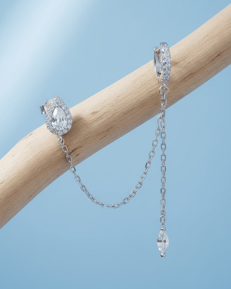 CZ pear shape stud chain-linked to hoop with dangling marquise shape.