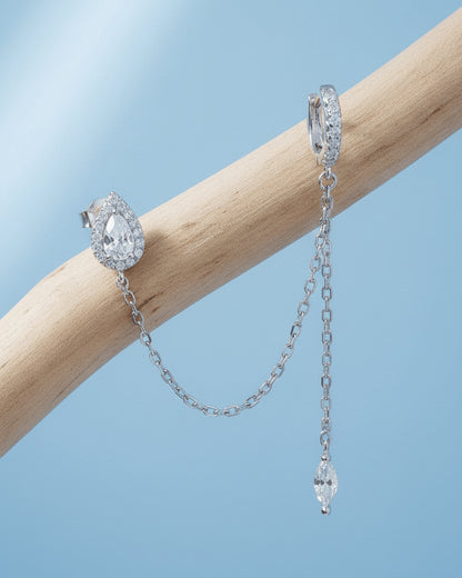 CZ pear shape stud chain-linked to hoop with dangling marquise shape.