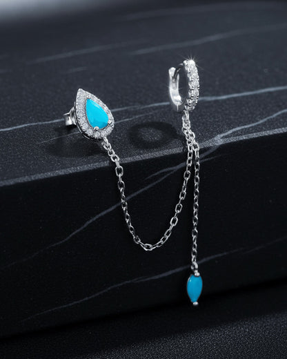 turquoise pear shape stud chain-linked to hoop with dangling marquise shape.