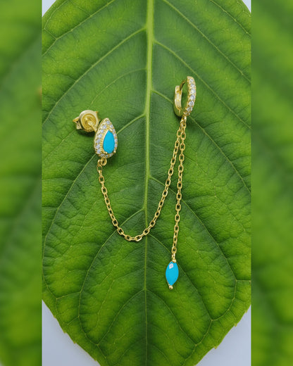 turquoise pear shape stud chain-linked to hoop with dangling marquise shape.