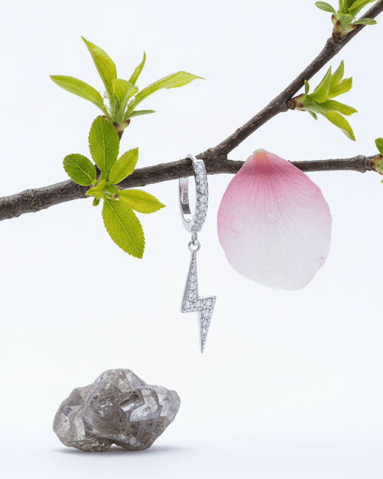 dangling bolt sign hoop earring.