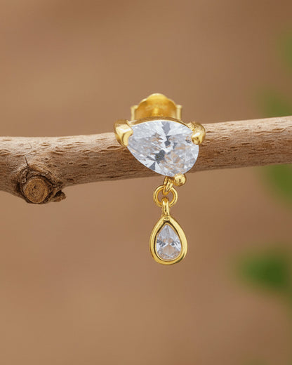 pear shape in prong setting with a dangling smaller pear in bezel setting stud earring.