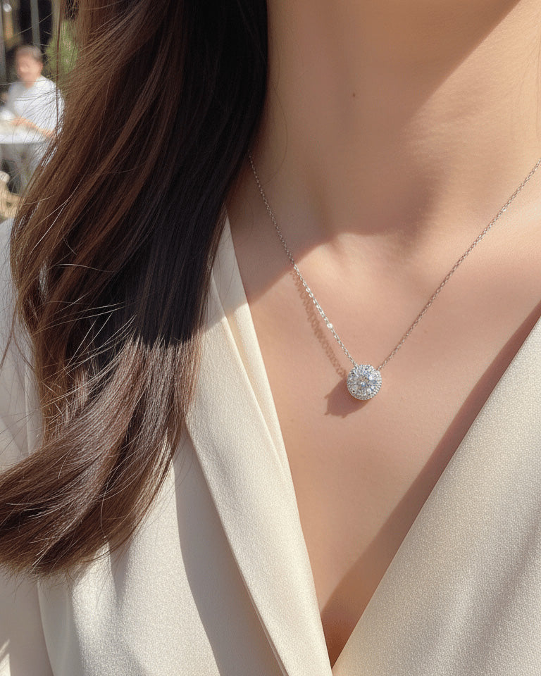 solitaire CZ necklace in halo setting.