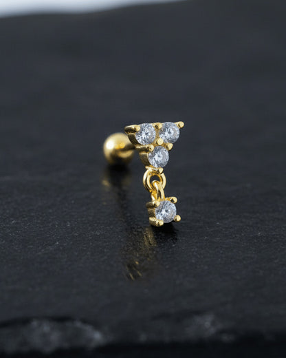 round three stones with dangling one ballback piercing earring.