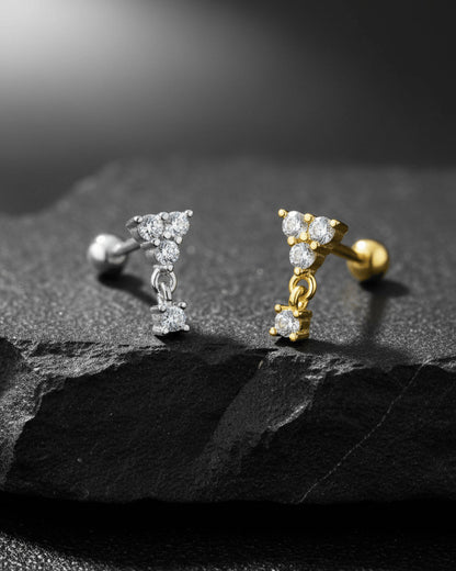 round three stones with dangling one ballback piercing earring.