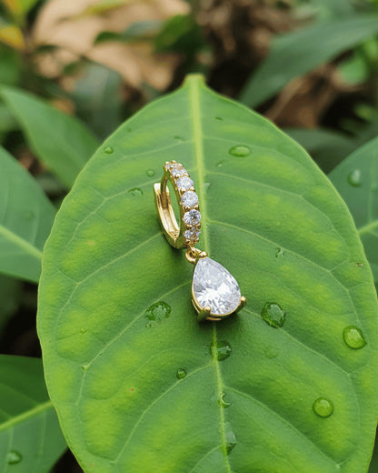 CZ tear drop shape huggie hoop earring.