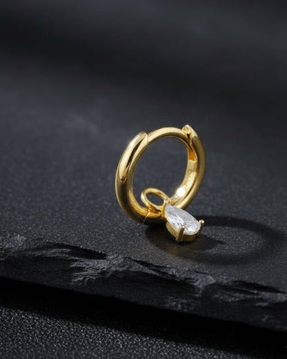 plain golden hoop with removable dangling drop shape stone.