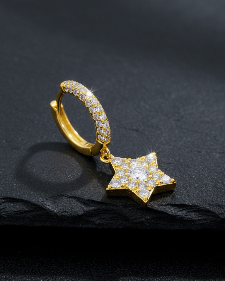 Dangling star hoops earrings.