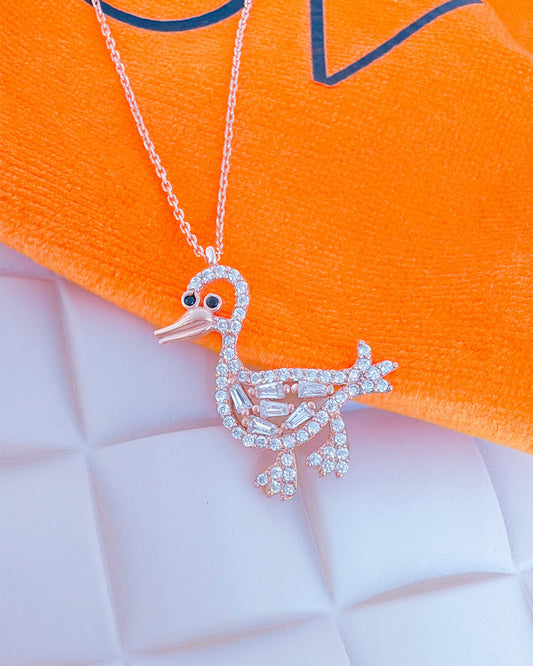 Duck shape rosegold necklace.