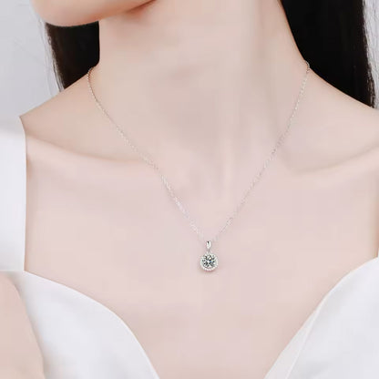 solitaire CZ in halo setting movable dangling necklace.