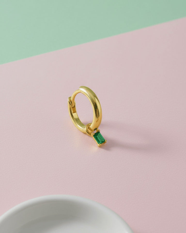 8 mm plain hoop with removable dangling rectangular emerald color CZ stone.