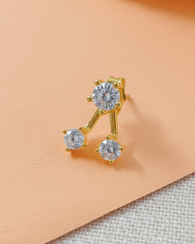 back to front huggie three stones earring.