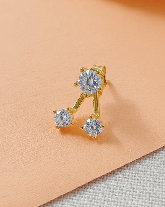 back to front huggie three stones earring.