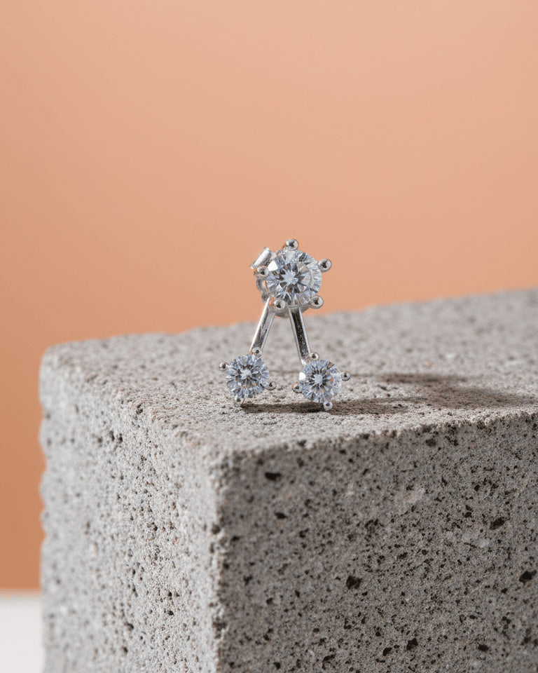 back to front huggie three stones earring.