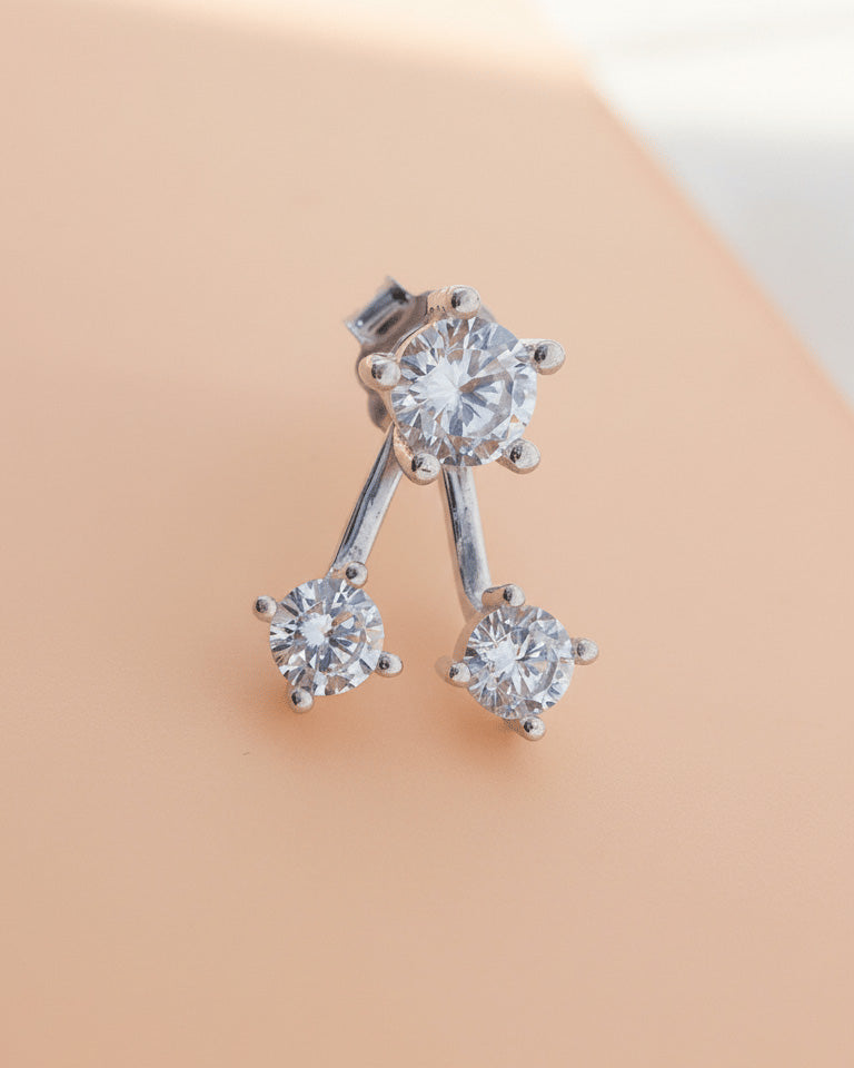 back to front huggie three stones earring.