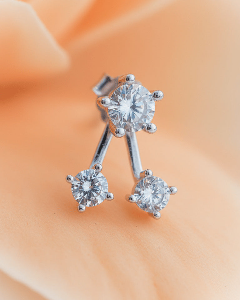 back to front huggie three stones earring.