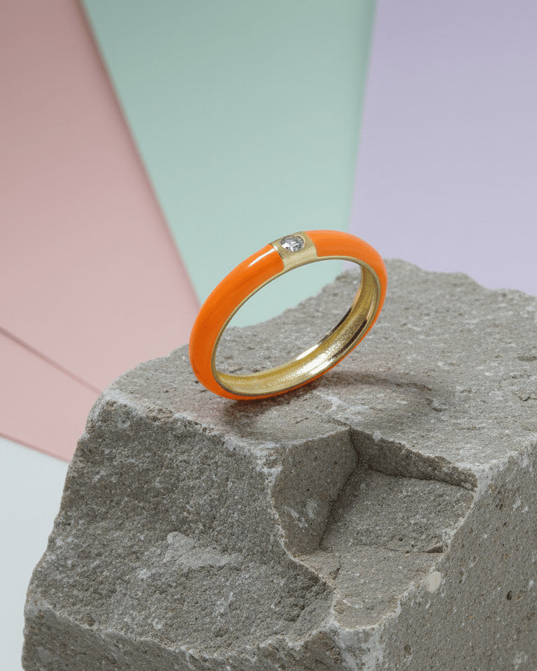 Enamel colors eternity rings with one round CZ stone.