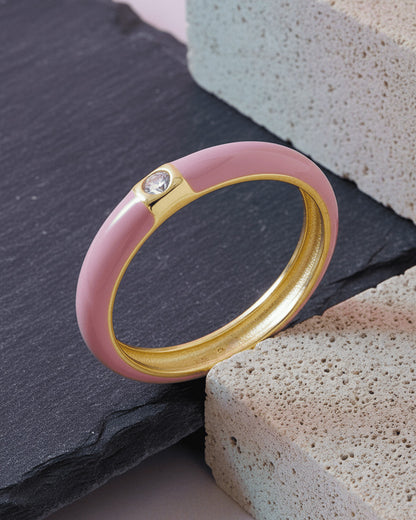 Enamel colors eternity rings with one round CZ stone.