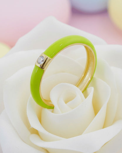 Enamel colors eternity rings with one round CZ stone.