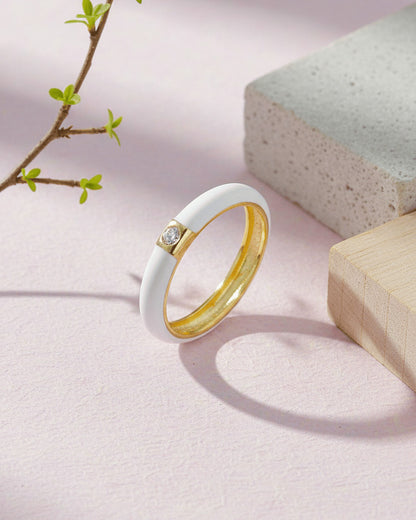 Enamel colors eternity rings with one round CZ stone.
