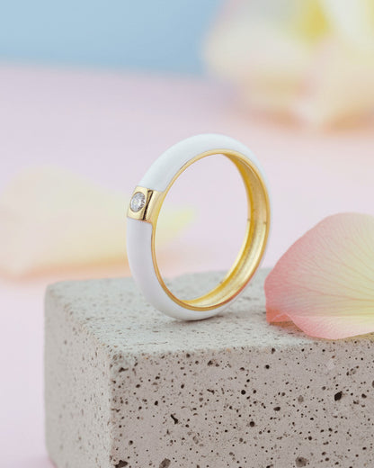 Enamel colors eternity rings with one round CZ stone.