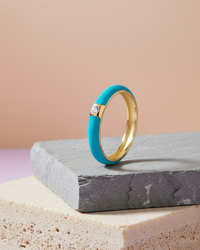Enamel colors eternity rings with one round CZ stone.