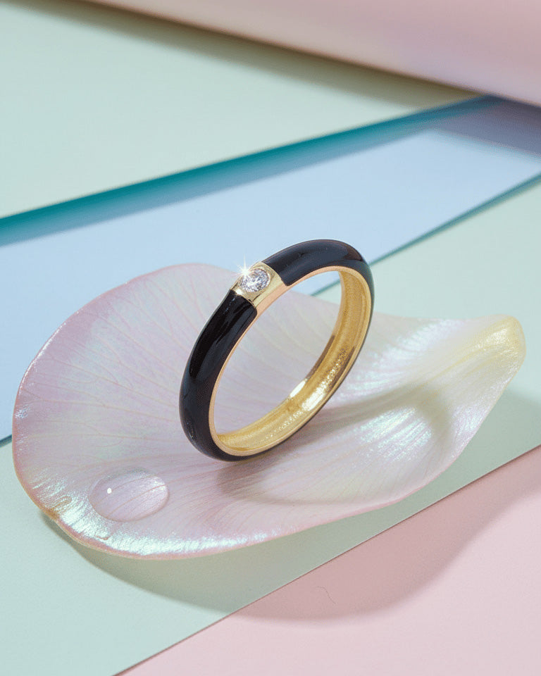 Enamel colors eternity rings with one round CZ stone.