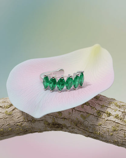ruby and emerald color marquise stones earcuffs.