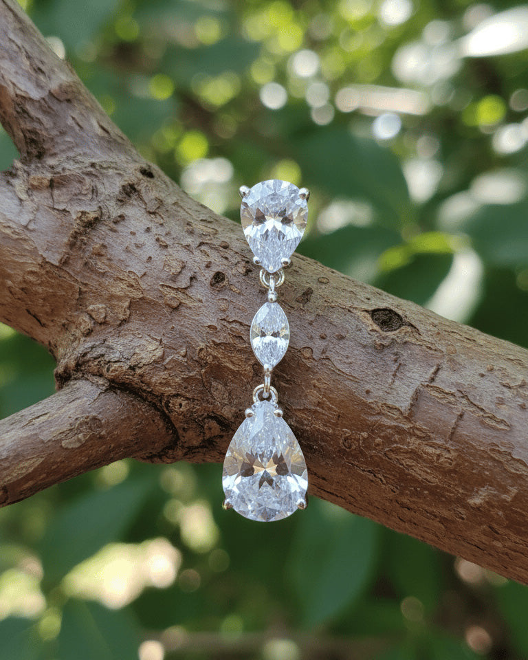 Pear and marquise shape drop earring.