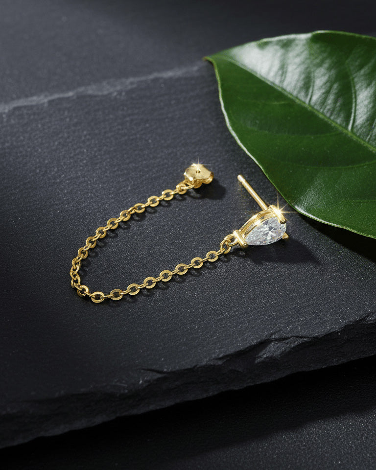 Pear shape back to front dangling chain earring.