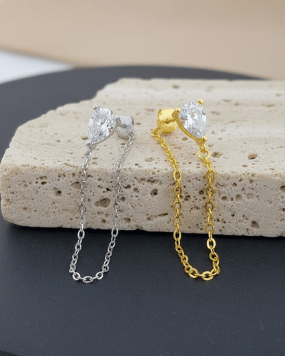 Pear shape back to front dangling chain earring.