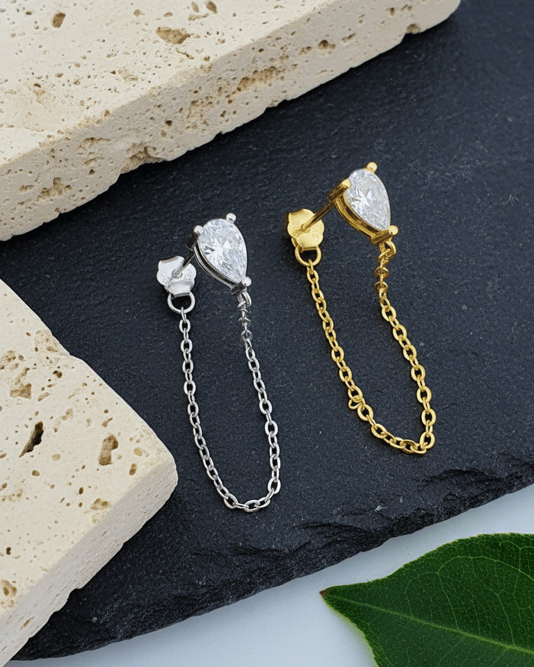 Pear shape back to front dangling chain earring.