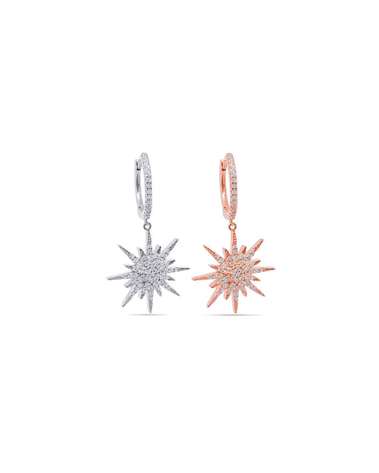 Dangling star earrings.