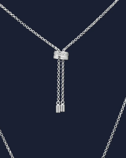 Safety pin shape CZ adjustable length necklace.