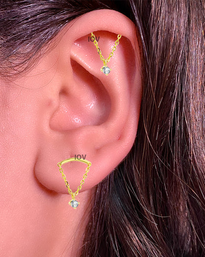 plain curve bar with dangling round stone stud earring.