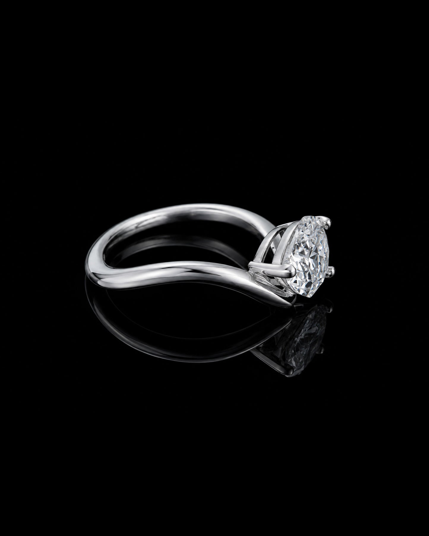 wavy shape ring with pear shape.