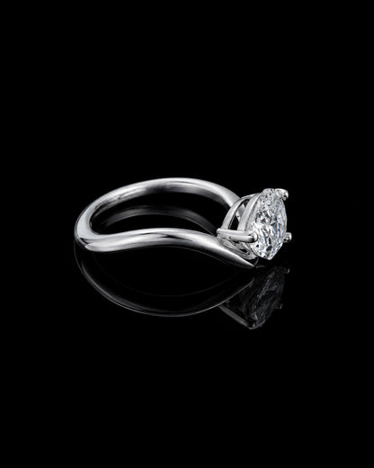 wavy shape ring with pear shape.