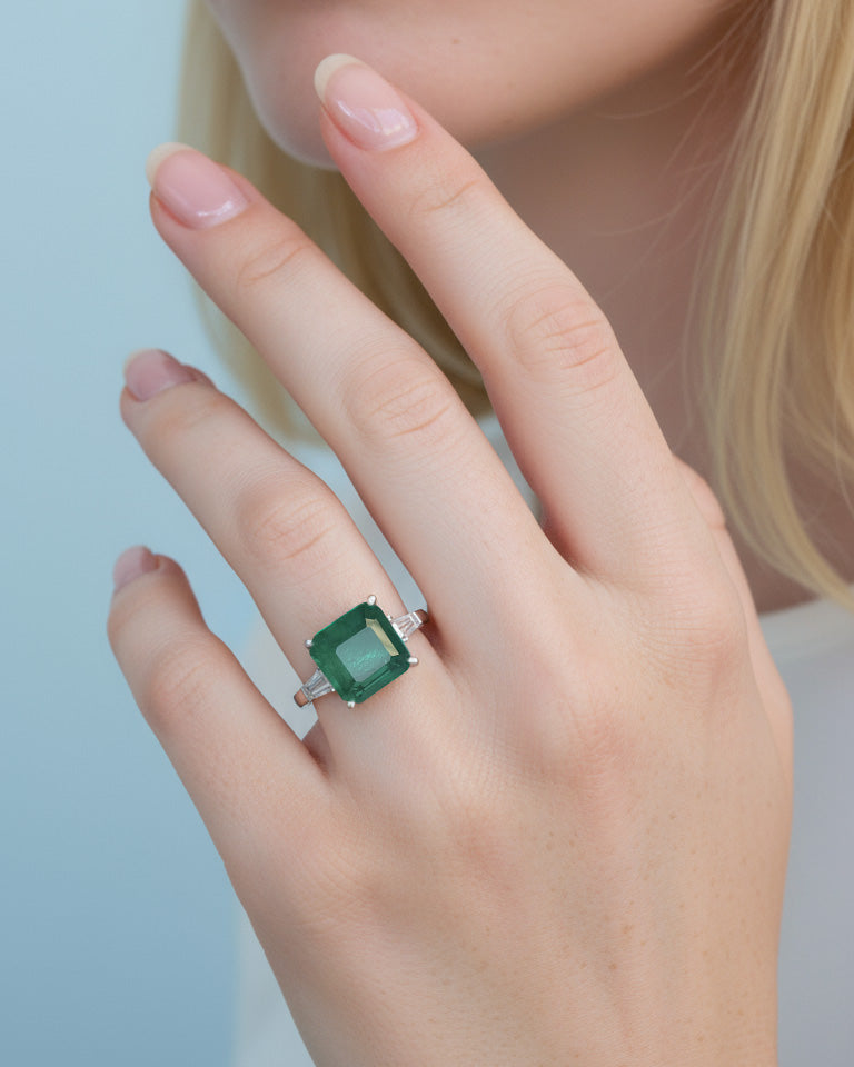 square emerald color agate stone with two cz tapers ring.