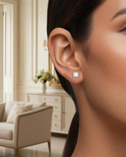 CZ round stone in a square halo setting stud earring.