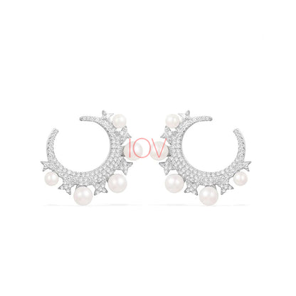 Crescent shape earrings with pearl.