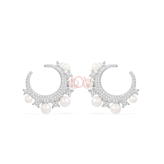 Crescent shape earrings with pearl.
